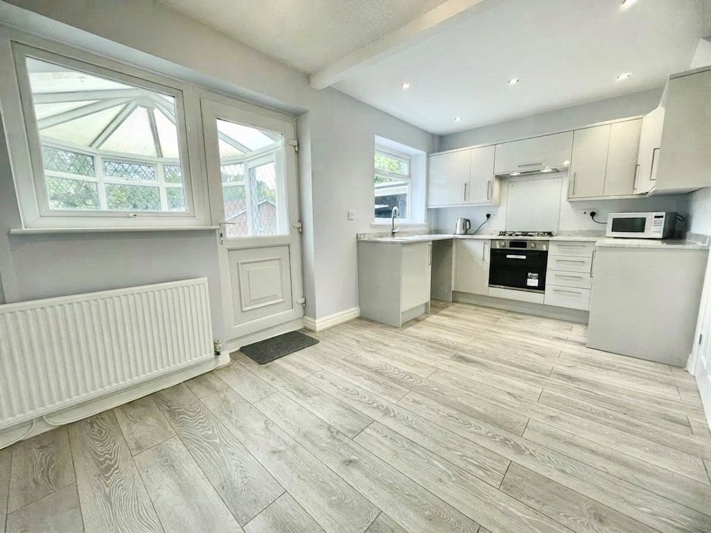 Property photo 2 of 12 Dining Kitchen