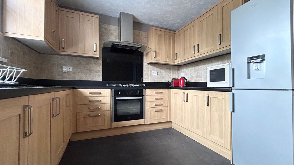 Property photo 2 of 12 Kitchen