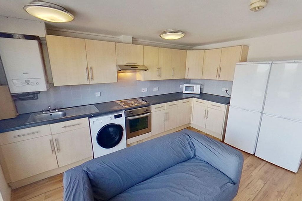 Property photo 1 of 4 This Well-Equipped Kitchen Features Modern Applian...