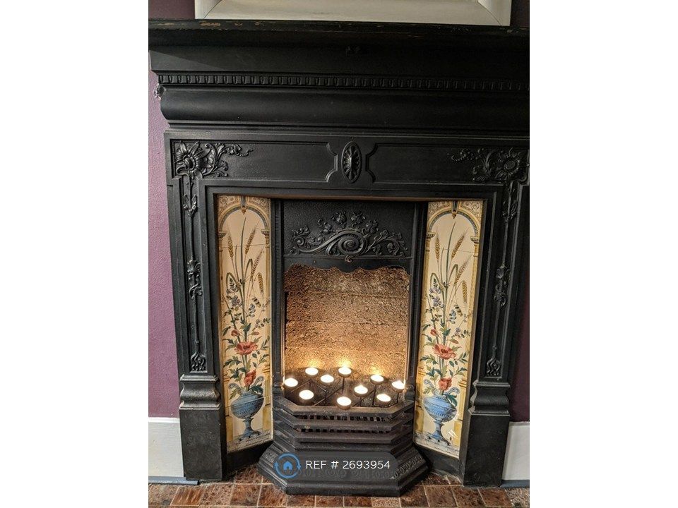 Property photo 3 of 9 Fireplace - Candles Only