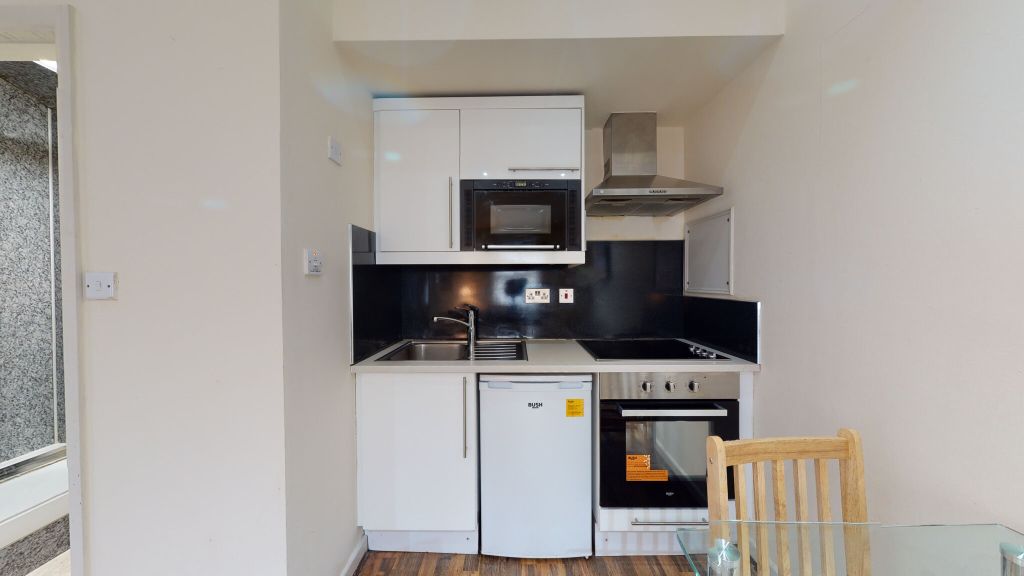 Property photo 2 of 12 Kitchen