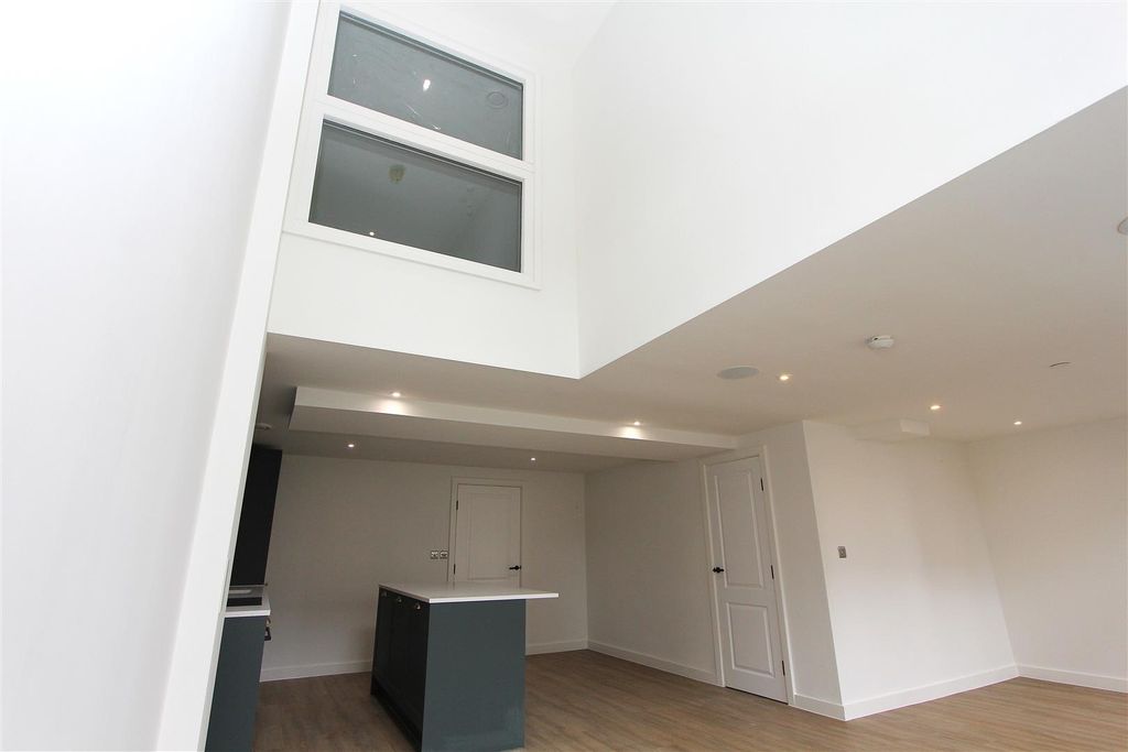 Property photo 2 of 17 Bright Modern Kitchen With Impressive High Ceiling...