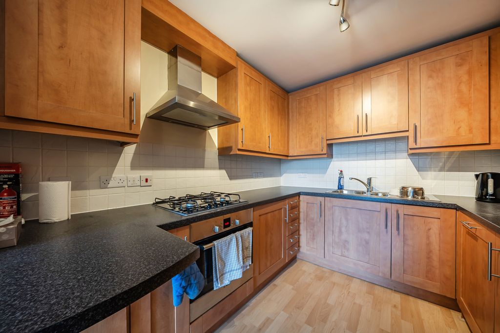 Property photo 2 of 11 Kitchen