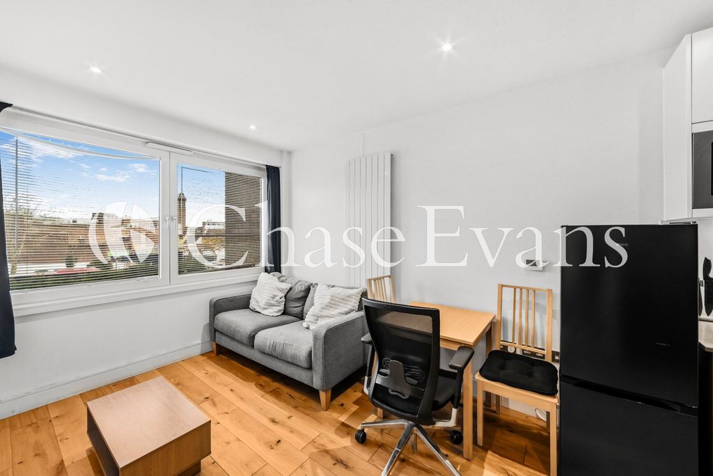 Property photo 3 of 8 Living Area