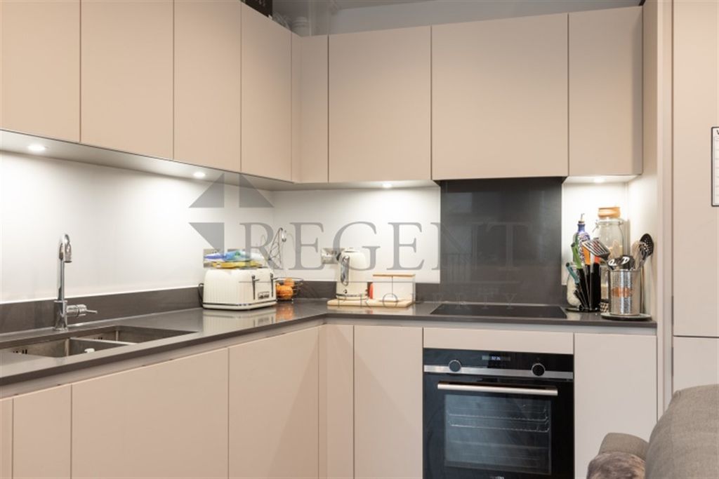 Property photo 3 of 8 Kitchen