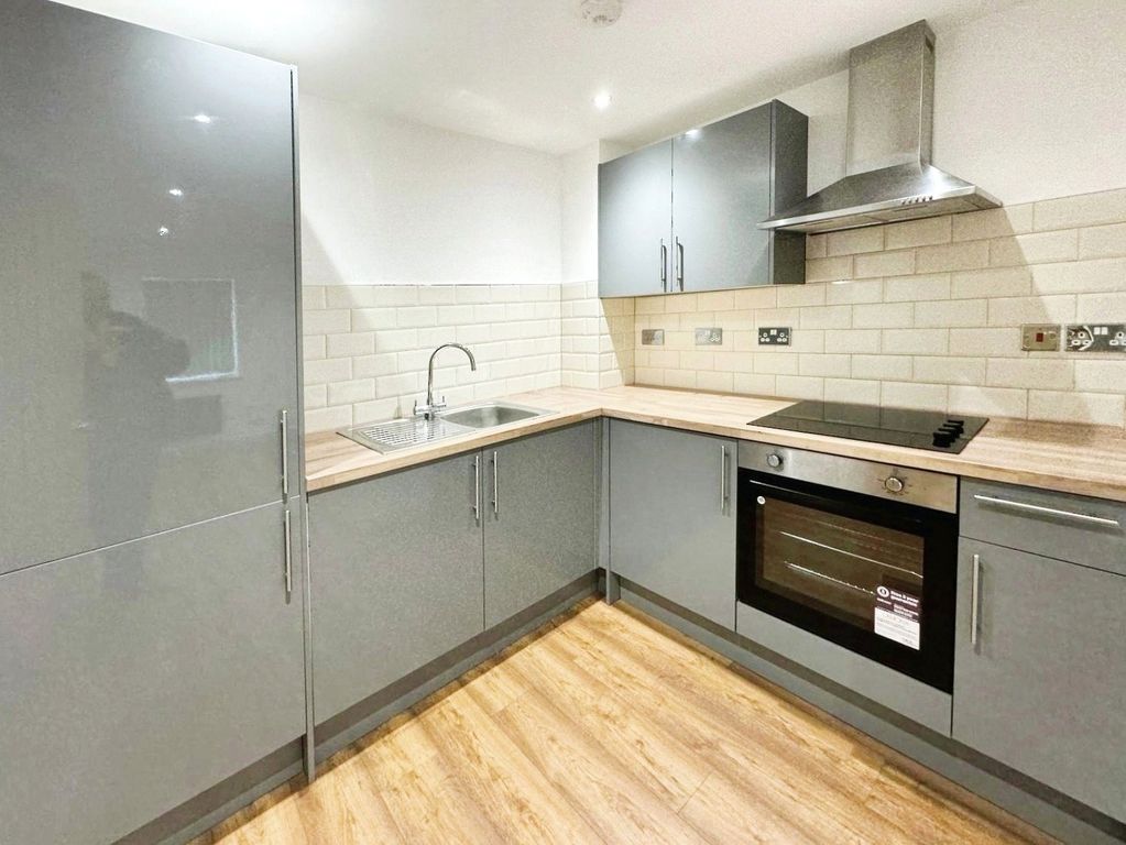Property photo 2 of 6 Kitchen Area