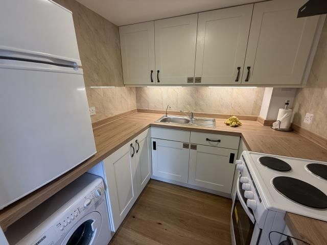 Property photo 3 of 8 Kitchen