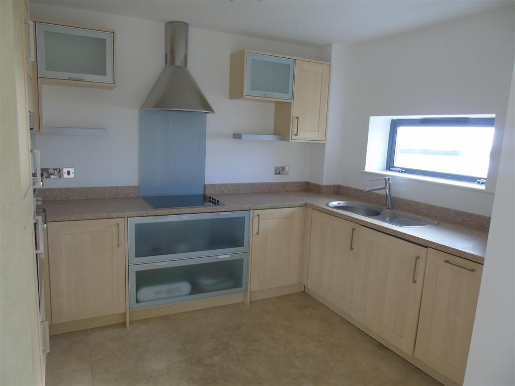 Property photo 3 of 9 Kitchen