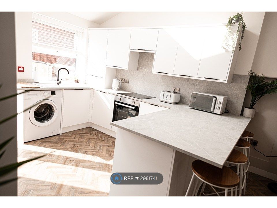 Property photo 3 of 8 Kitchen Area