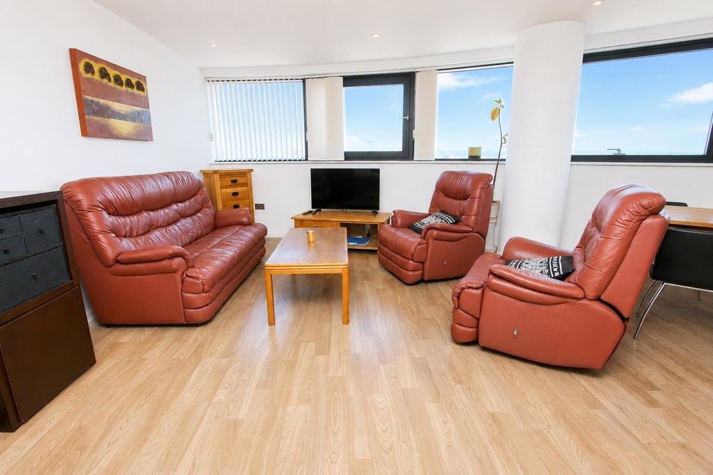 Property photo 2 of 10 Bright Lounge With Large Windows And Sofa Seating...