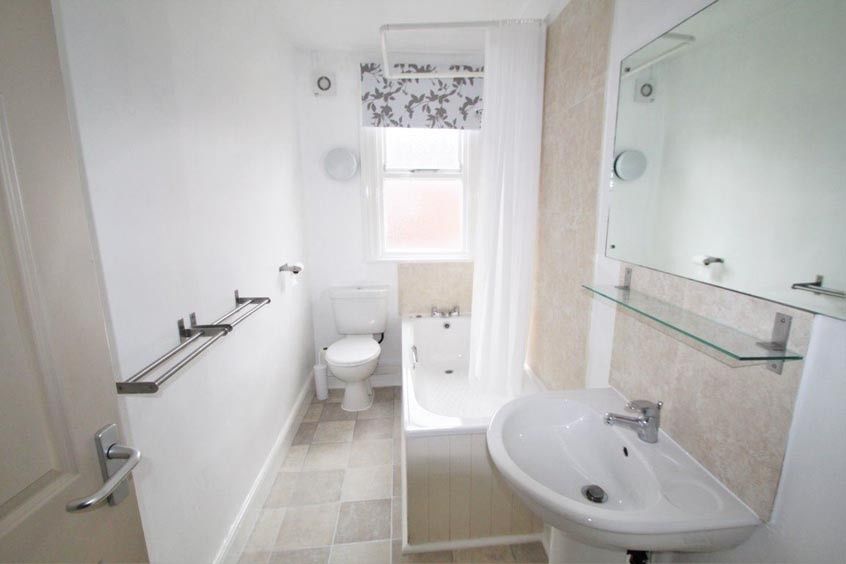 Property photo 3 of 9 A Bright, Well-Maintained Bathroom Featuring A Lar...