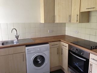 Property photo 3 of 12 Kitchen