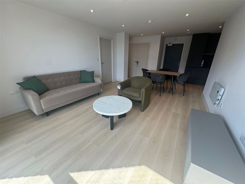 Property photo 2 of 18 Living Area