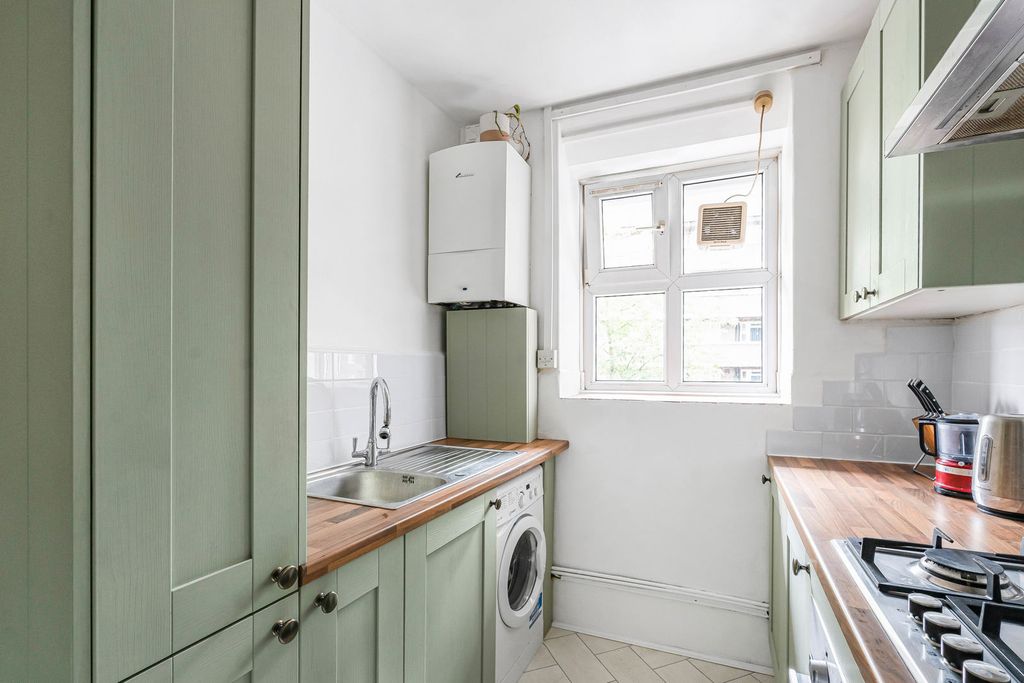 Property photo 3 of 12 Kitchen