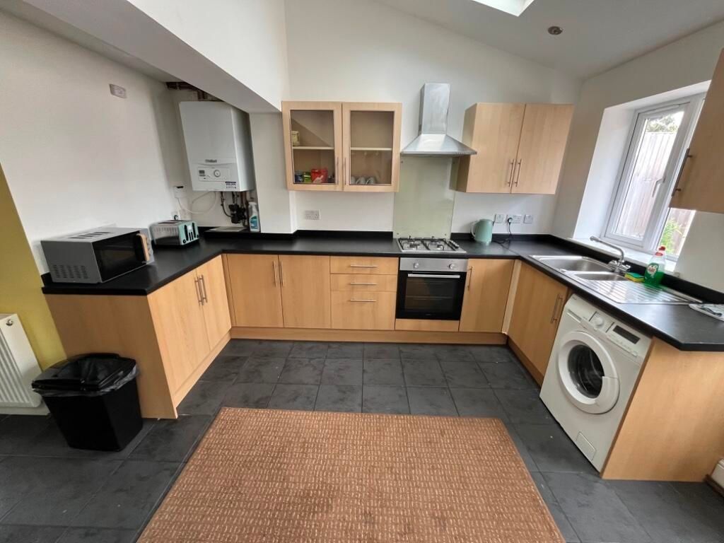 Property photo 2 of 7 Modern Fitted Kitchen With Light Wood Cabinets, Bl...