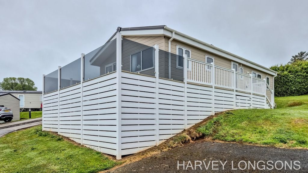 Property photo 1 of 21 Delta Lakeside Lodge With Large Wraparound Decking At Polperro Holiday Park In Cornwall