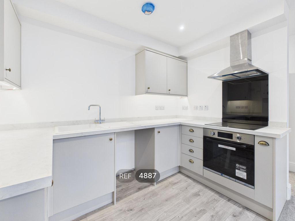 Property photo 3 of 12 Kitchen / Living Area