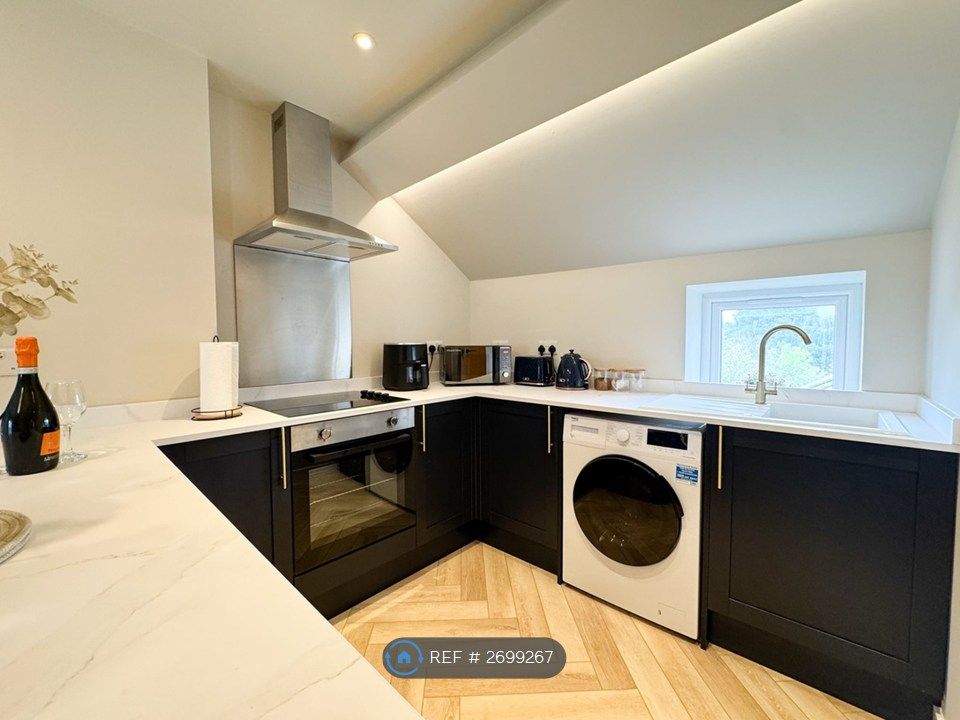 Property photo 1 of 13 Kitchen / Living Room