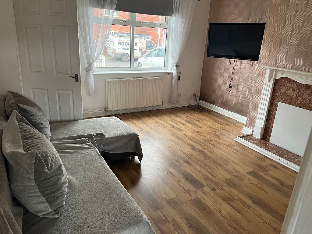 Property photo 2 of 8 Living Room