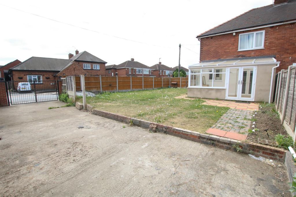 Property photo 2 of 12 Side And Rear Gardens