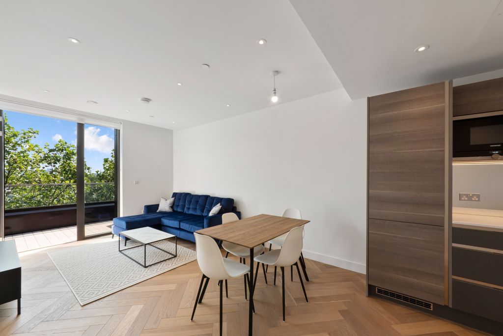 Property photo 1 of 12 Living Area