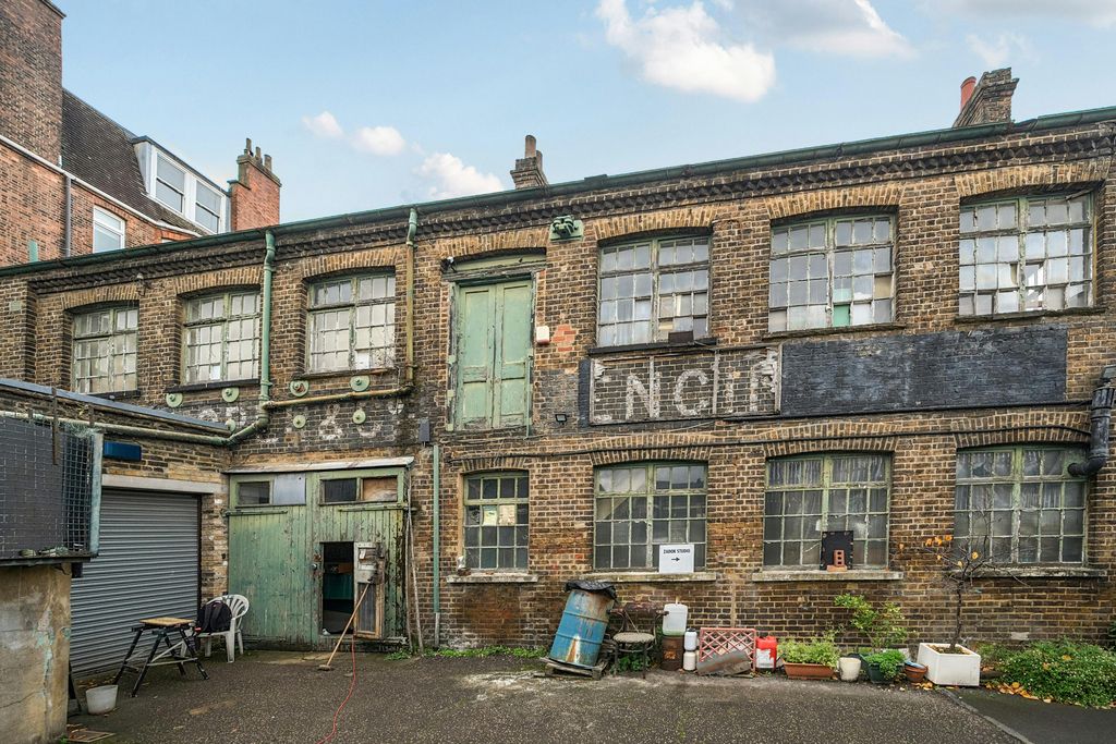 Property photo 1 of 11 Brick Building Facade 2.Jpg