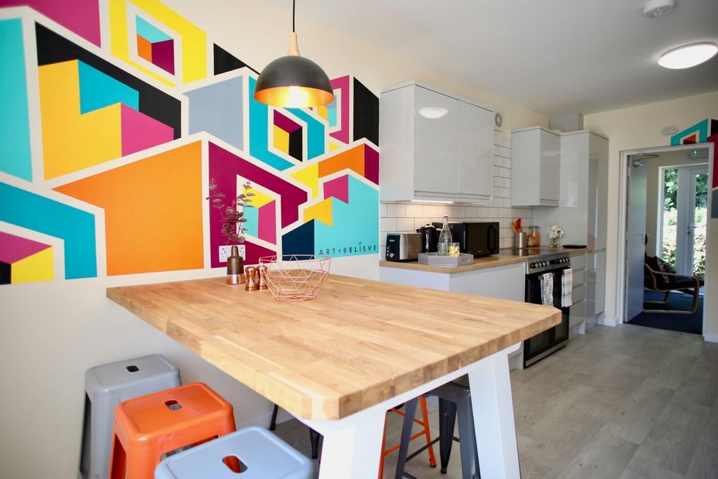 Property photo 2 of 5 Bright Modern Kitchen With A Large Wooden Breakfas...