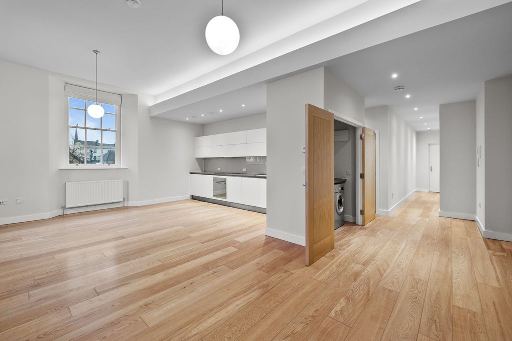 Property photo 3 of 12 Kitchen Living Space