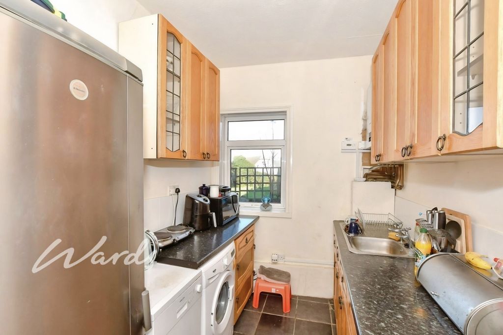 Property photo 3 of 9 1693466c-Kitchen