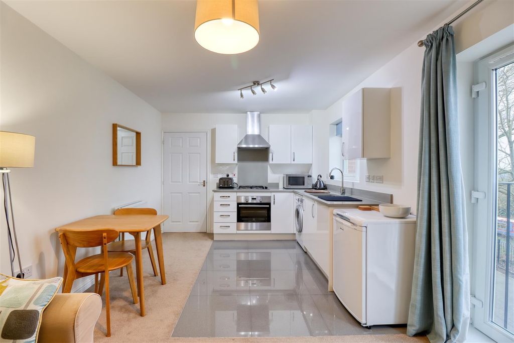 Property photo 3 of 11 Kitchen And Living Area