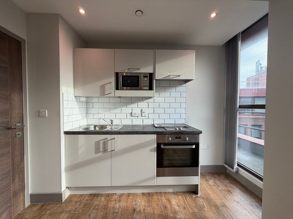 Property photo 2 of 11 Kitchen