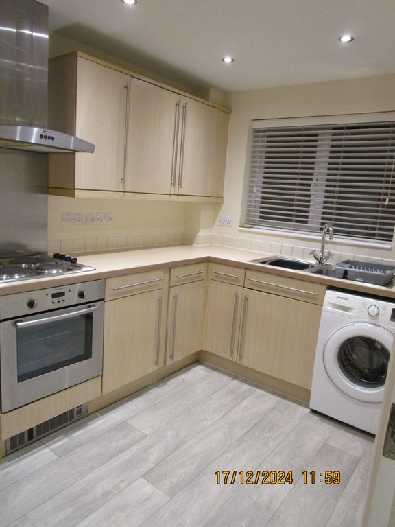 Property photo 3 of 10 Stylish Kitchen 