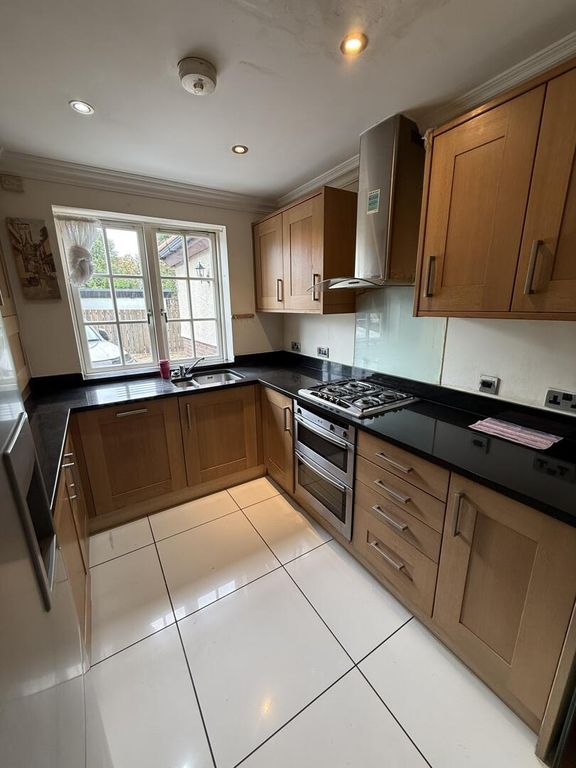Property photo 3 of 13 Kitchen