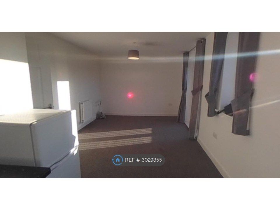 Property photo 1 of 8 Living Area