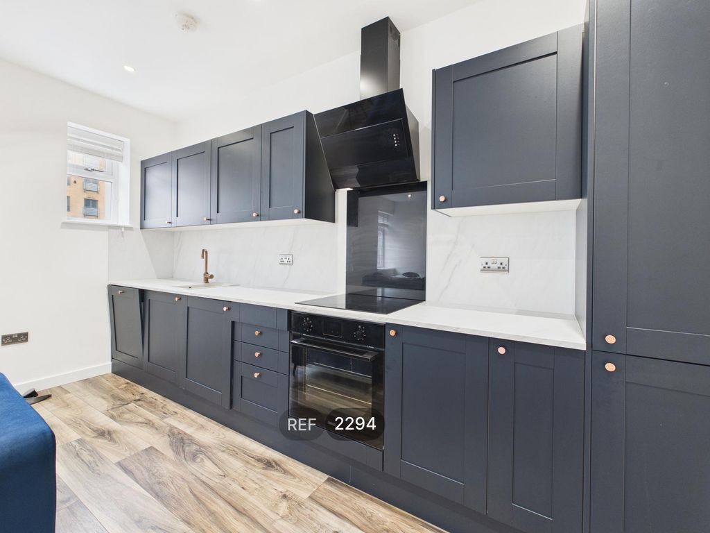 Property photo 2 of 16 Kitchen/Living Area