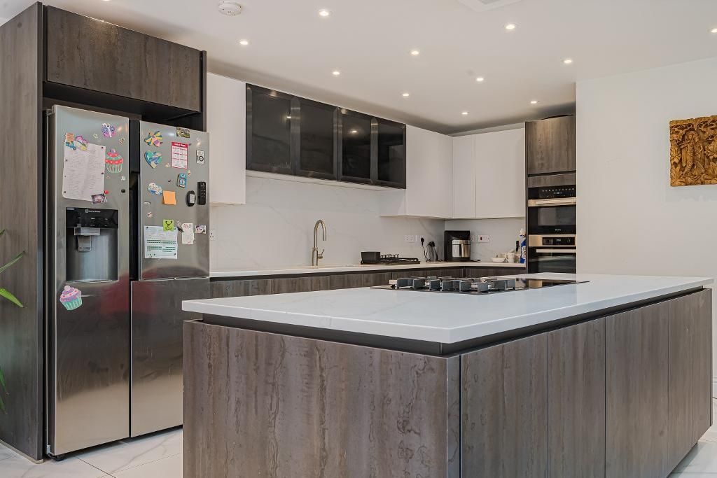 Property photo 3 of 18 Kitchen/Dining/Family Room