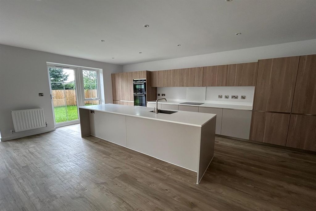 Property photo 3 of 13 Kitchen Area