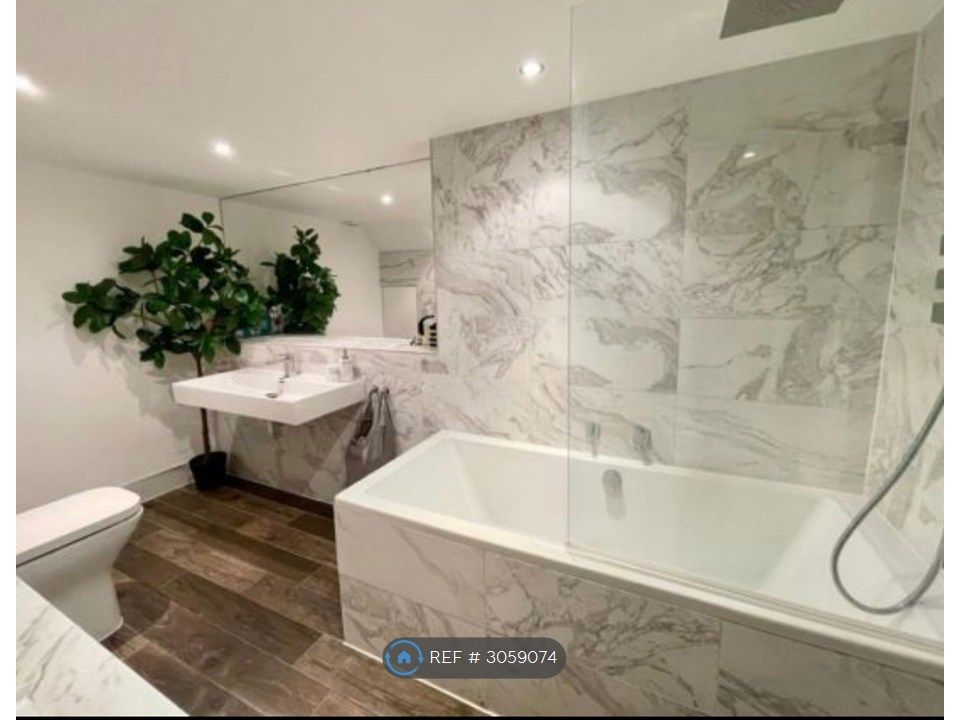 Property photo 3 of 14 Bathroom With Full Bath And Shower