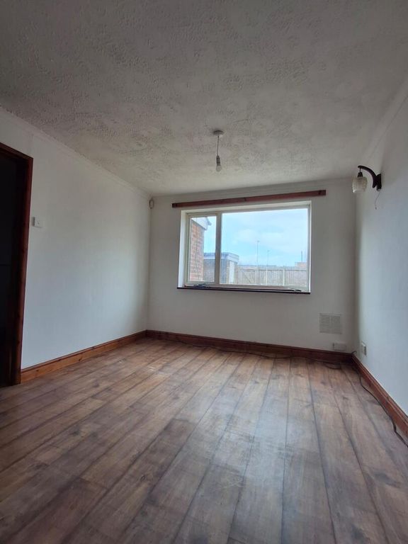 Property photo 3 of 8 Living Room