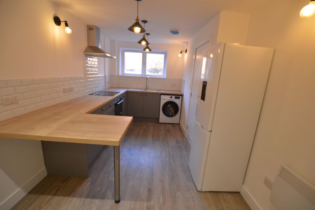 Property photo 1 of 7 Kitchen Area