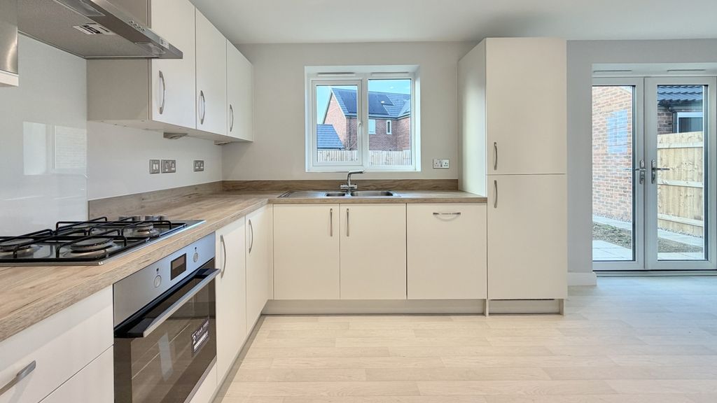 Property photo 3 of 17 Kitchen Dining Room