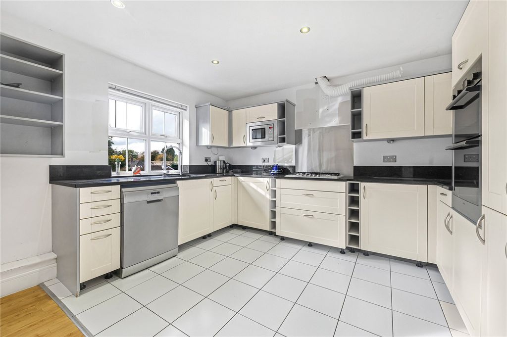 Property photo 3 of 13 Kitchen Area