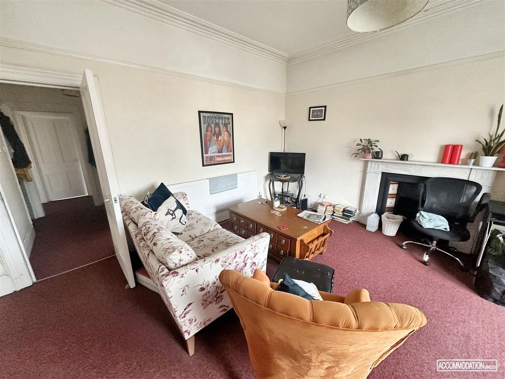 Property photo 2 of 12 Bright And Cozy Lounge Area With Character....