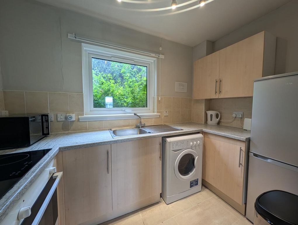 Property photo 3 of 6 Kitchen