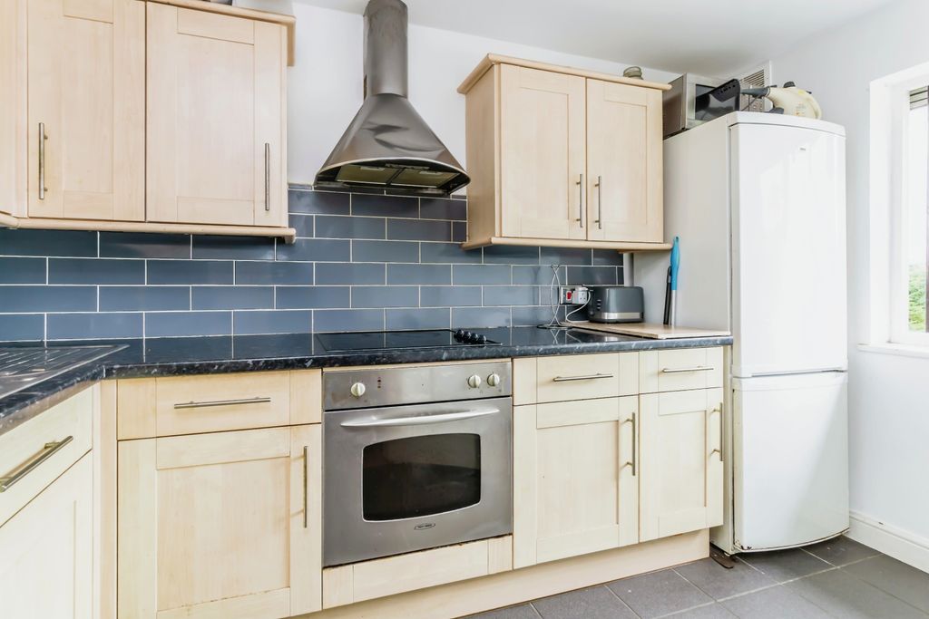 Property photo 3 of 13 Kitchen