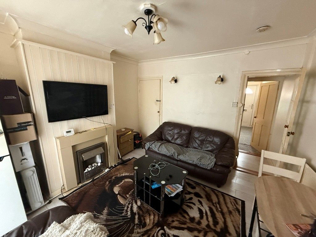 Property photo 3 of 11 Dining Room With Table And Sofa