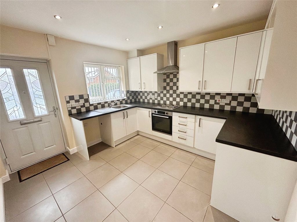 Property photo 3 of 7 Kitchen
