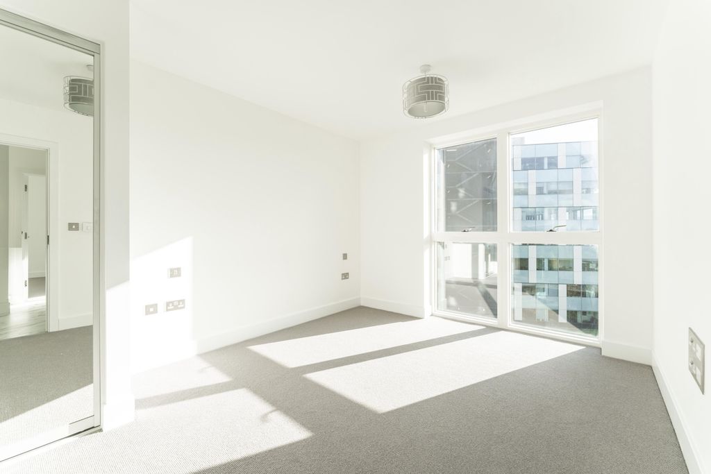 Property photo 3 of 13 Bright And Airy Double Bedroom Featuring Large Win...
