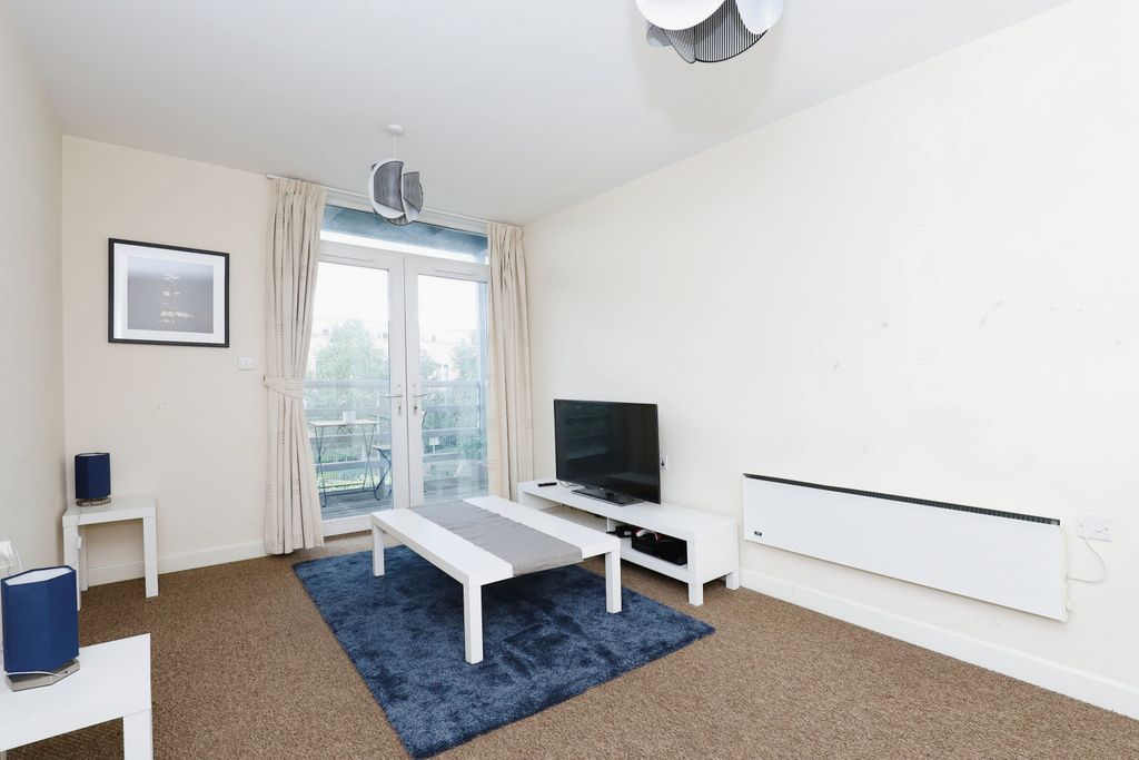 Property photo 2 of 15 Living Area