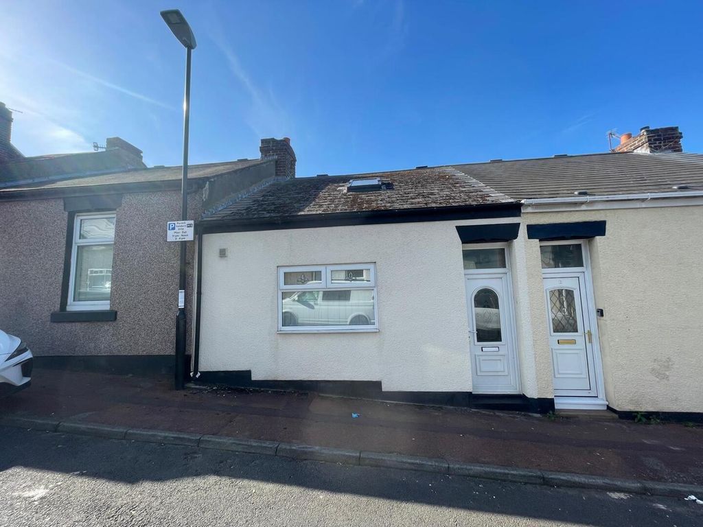 Property photo 1 of 12 Front (Exterior)